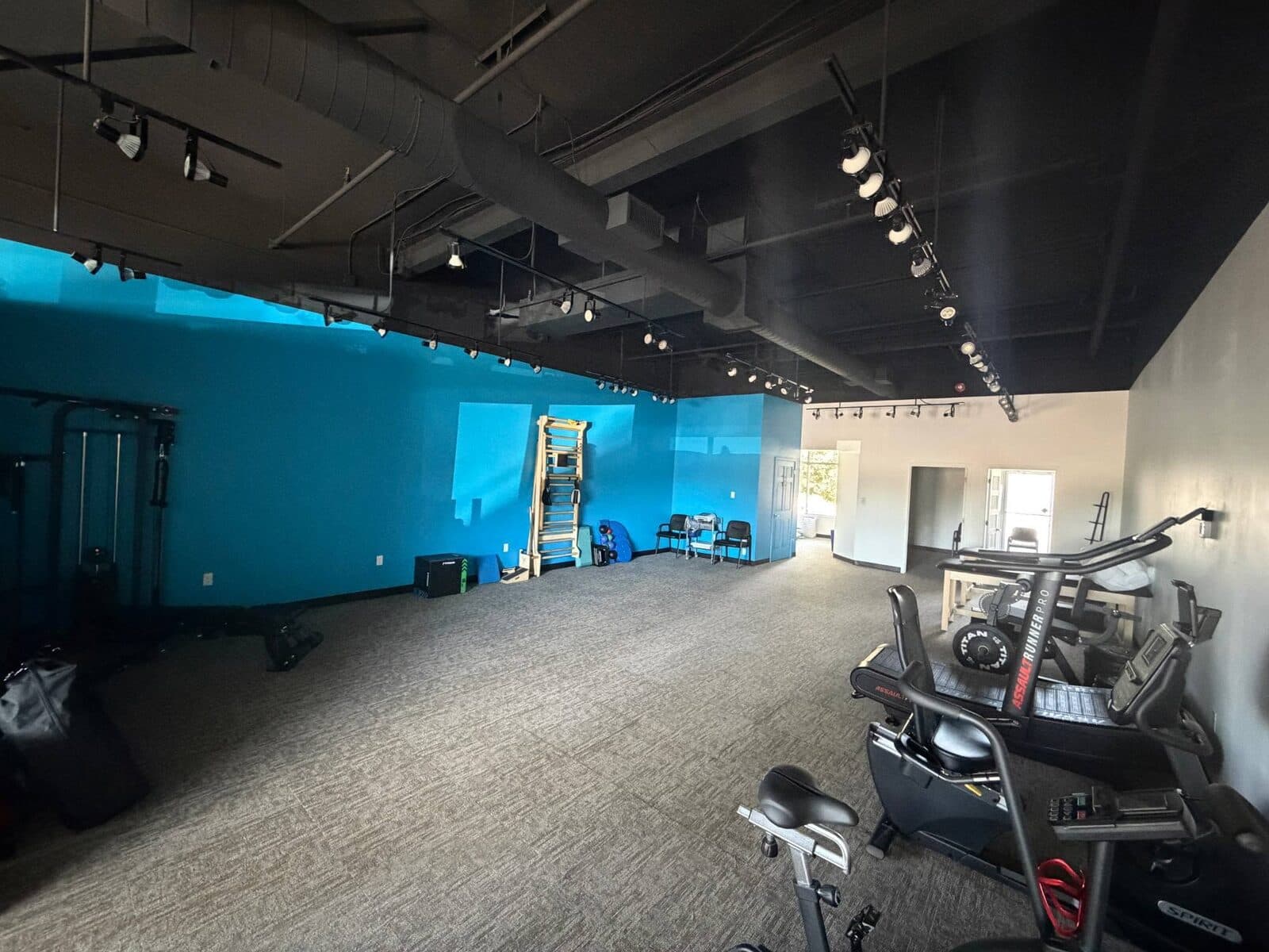 Commercial space with a turquoise feature wall